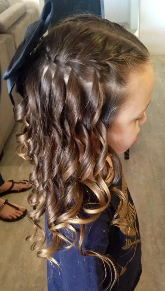 twisted-waterfall-hairstyle-with-bow