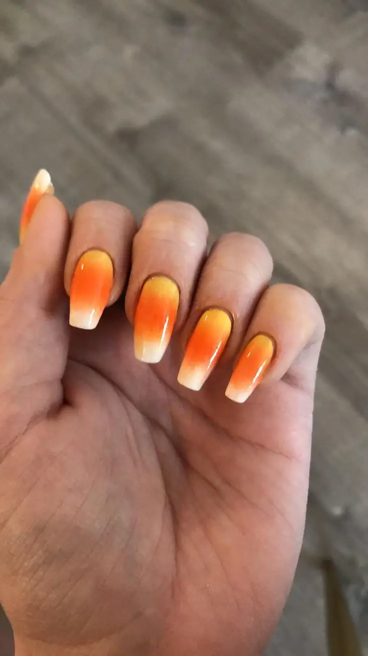 candy-corn-chic-halloween-nail-design