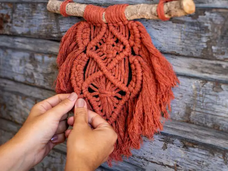 hand-making-a-diy-macrame-wall-hanging