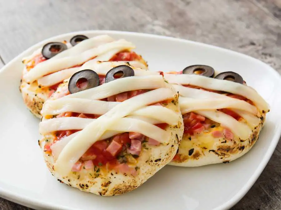 three-mummy-pizzas-in-a-serving-plate