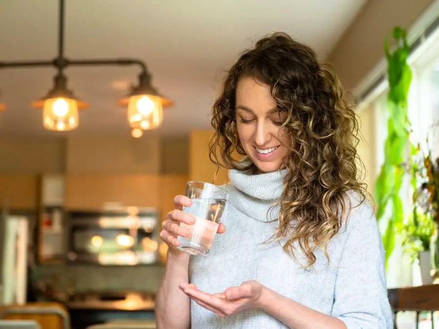 taking-hair-supplement