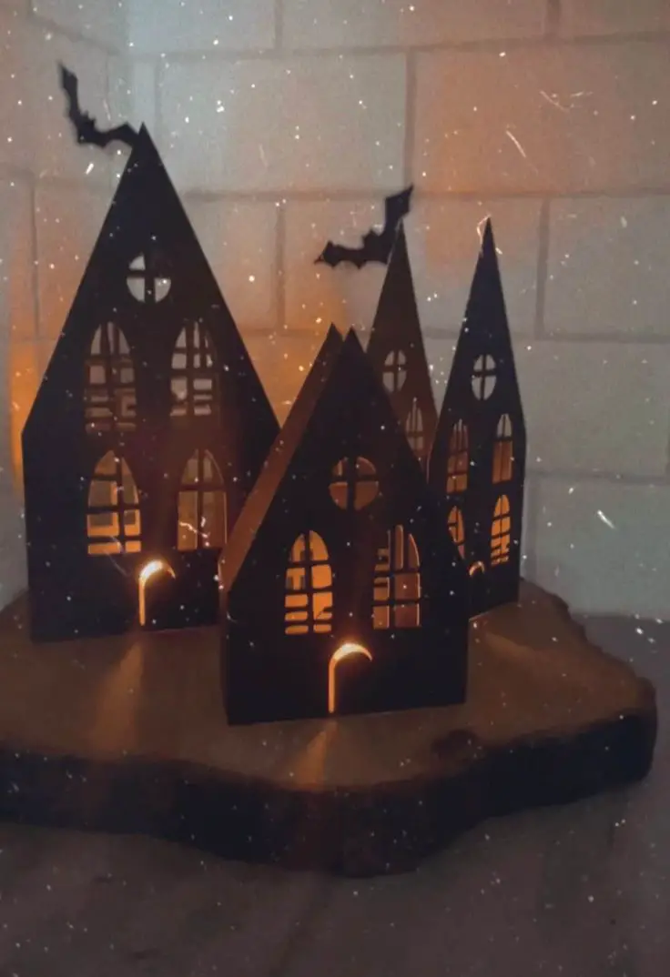 haunted-house-silhouette-unique-pumpkin-carving-ideas