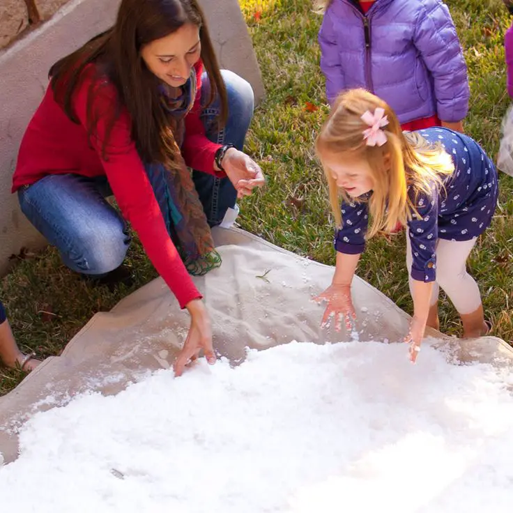 faux-snow-toss-moment-wonderland-party-ideas