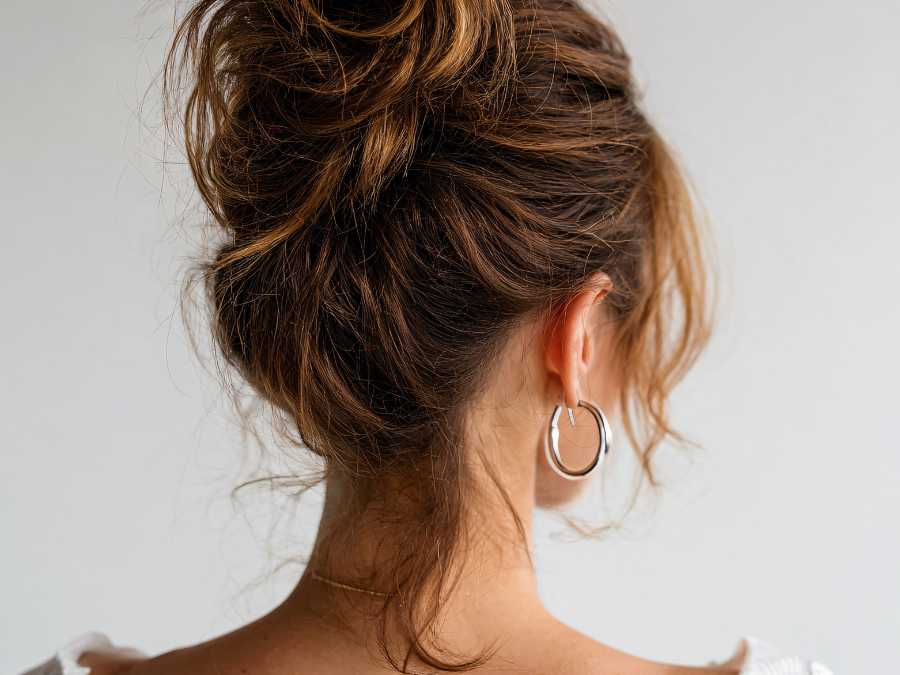 messy-textureed-bun-winter-hairstyle-ideas