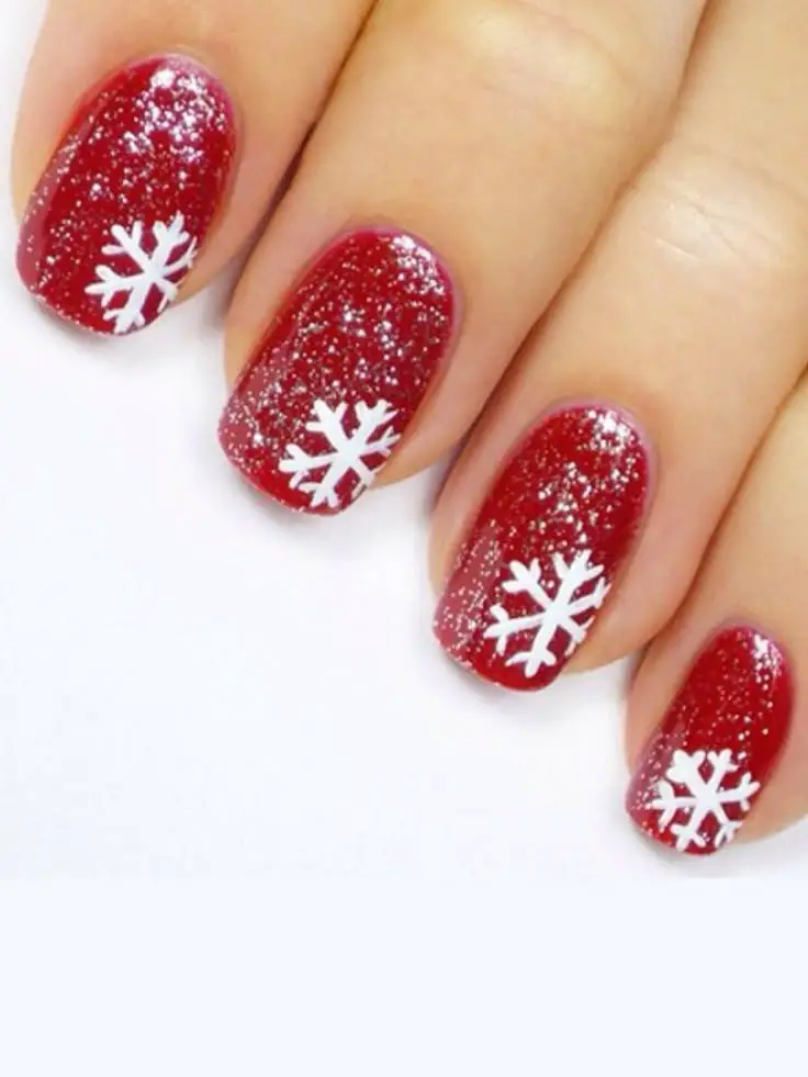red-glitter-with-snowflake-accents-red-chriatmas-nail-ideas