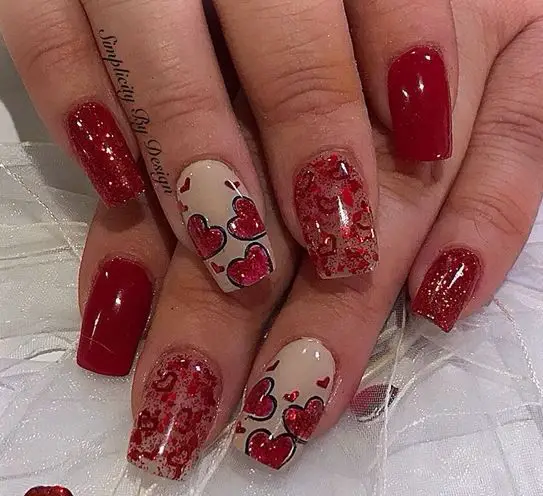 red-heart-and-sparkles-stunning-red-christmas-nail-ideas