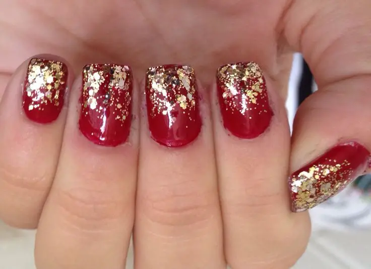 red-and-gold-glitter-tips-red-christmas-nail-ideas-