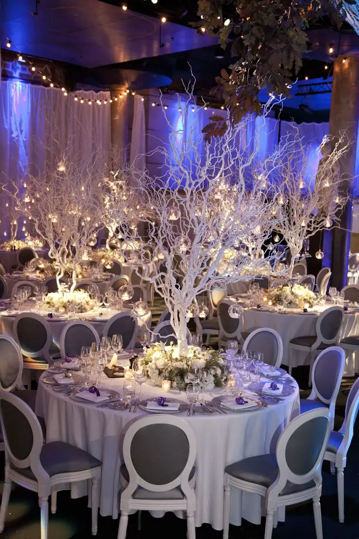 white-forest-table-centerpieces-captivating-winter-wonderland-party-ideas