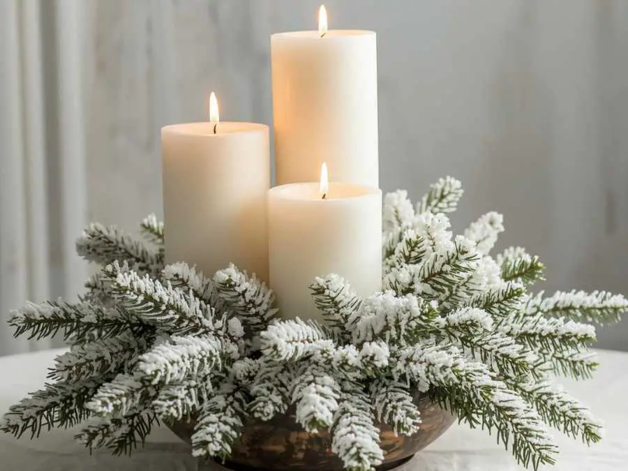 white-candle-arrangement-with-winter-greenery