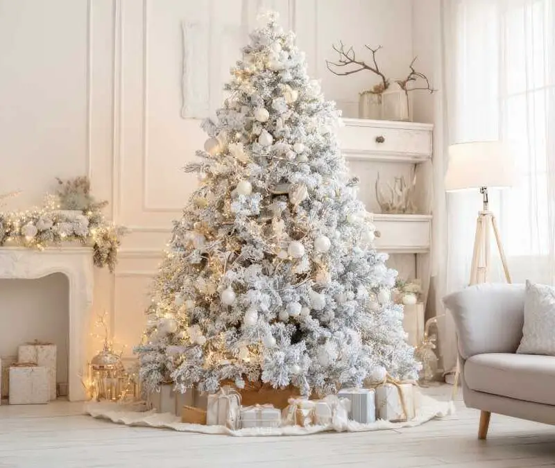 white-flocked-christmas-tree-with-warm-white-lights-white-christmas-decor-ideas