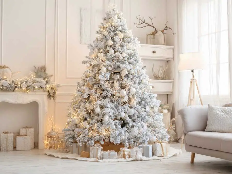 white-flocked-christmas-tree-with-warm-white-lights-white-christmas-decor-ideas