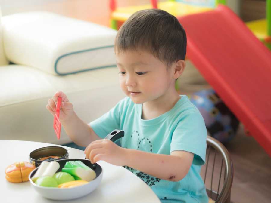Pretend-cooking-with-play-food