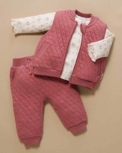 quilited-vest-over-long-sleeve-top