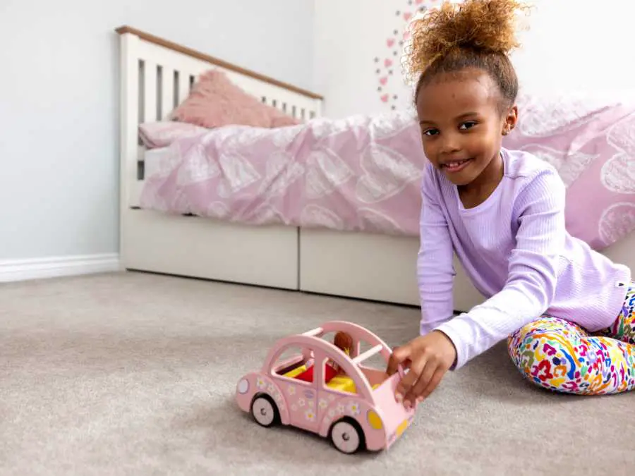 Rolling-a-small-toy-car-back-and-forth