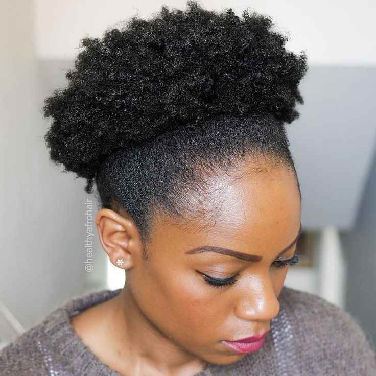 high-puff-baby-girl-hairstyle-for-4c-short-hair